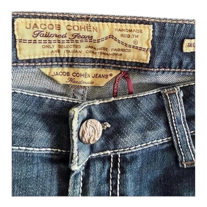 TrickandChic damskie jeansy Jacob Cohen z japońskiego denimu z widoczną skórzaną metką i posrebrzanym guzikiem