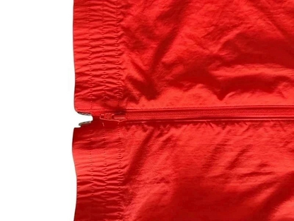 TrickandChic pomarańczowa wiatrówka Adidas Originals z ortalionu z widocznym zamkiem błyskawicznym i ściągaczem