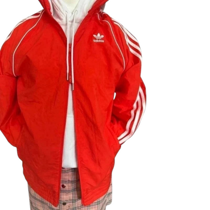 TrickandChic pomarańczowa wiatrówka Adidas Originals z białymi paskami i logo Trefoil w stylu retro Y2K