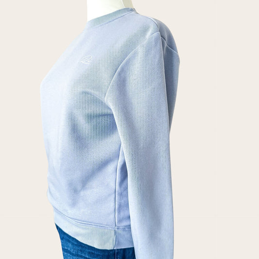 TrickandChic błękitna bluza damska River Island z okrągłym dekoltem i haftowanym logo na piersi