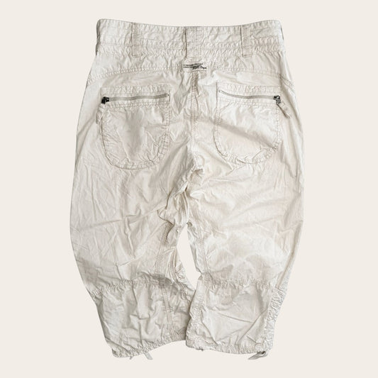 Damskie spodnie cargo 3/4 TrickandChic marki H&M w kolorze ecru z bawełny z kieszeniami na zamek i ściągaczami