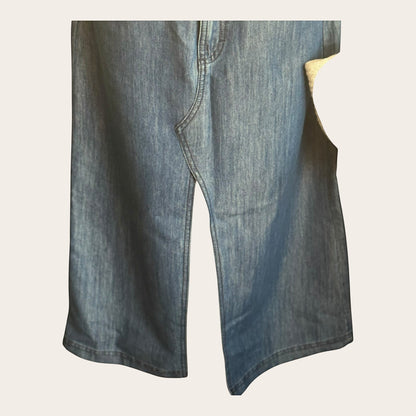 Granatowa spódnica jeansowa vintage marki OVS z kolekcji TrickandChic o kroju midi z rozporkiem z przodu