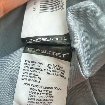 Metka wewnętrzna ze składem materiału spódnicy TrickandChic Top Secret z bawełny i poliestru